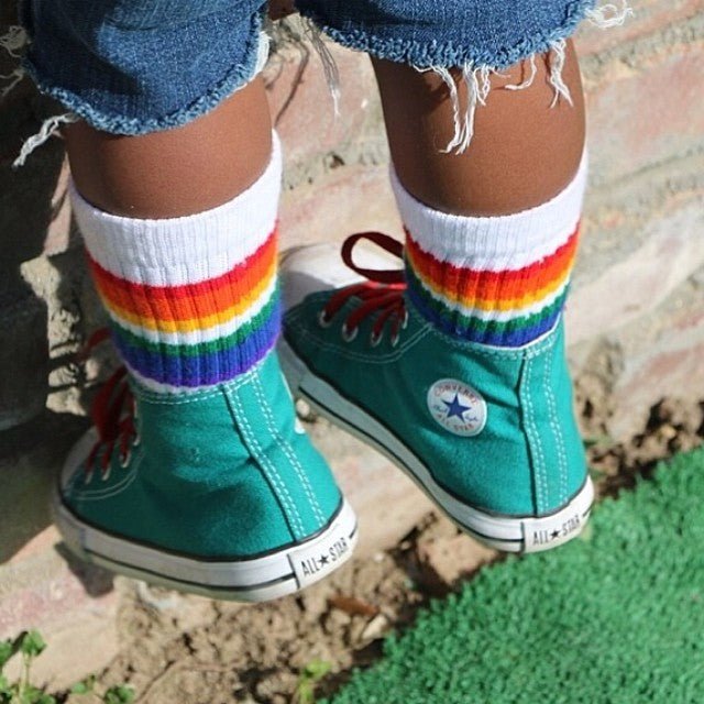 Close-up of Love rainbow baby socks by Pride Socks