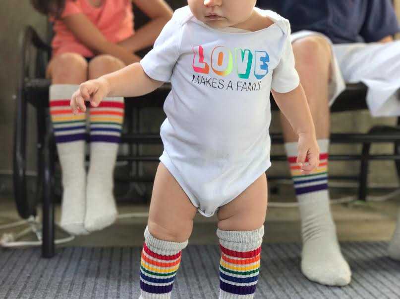 love is love.  love makes a family.  love my toddler tube pride socks
