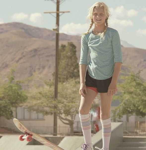 Rainbow compression socks by Pride Socks for athletic performance and pride expression