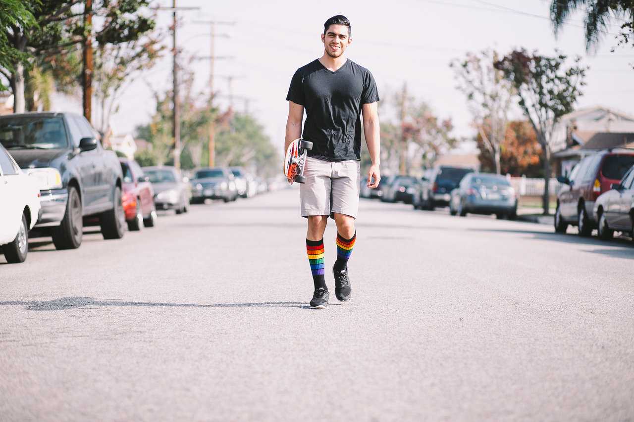 proud ally male model in my rainbow knee high pride socks