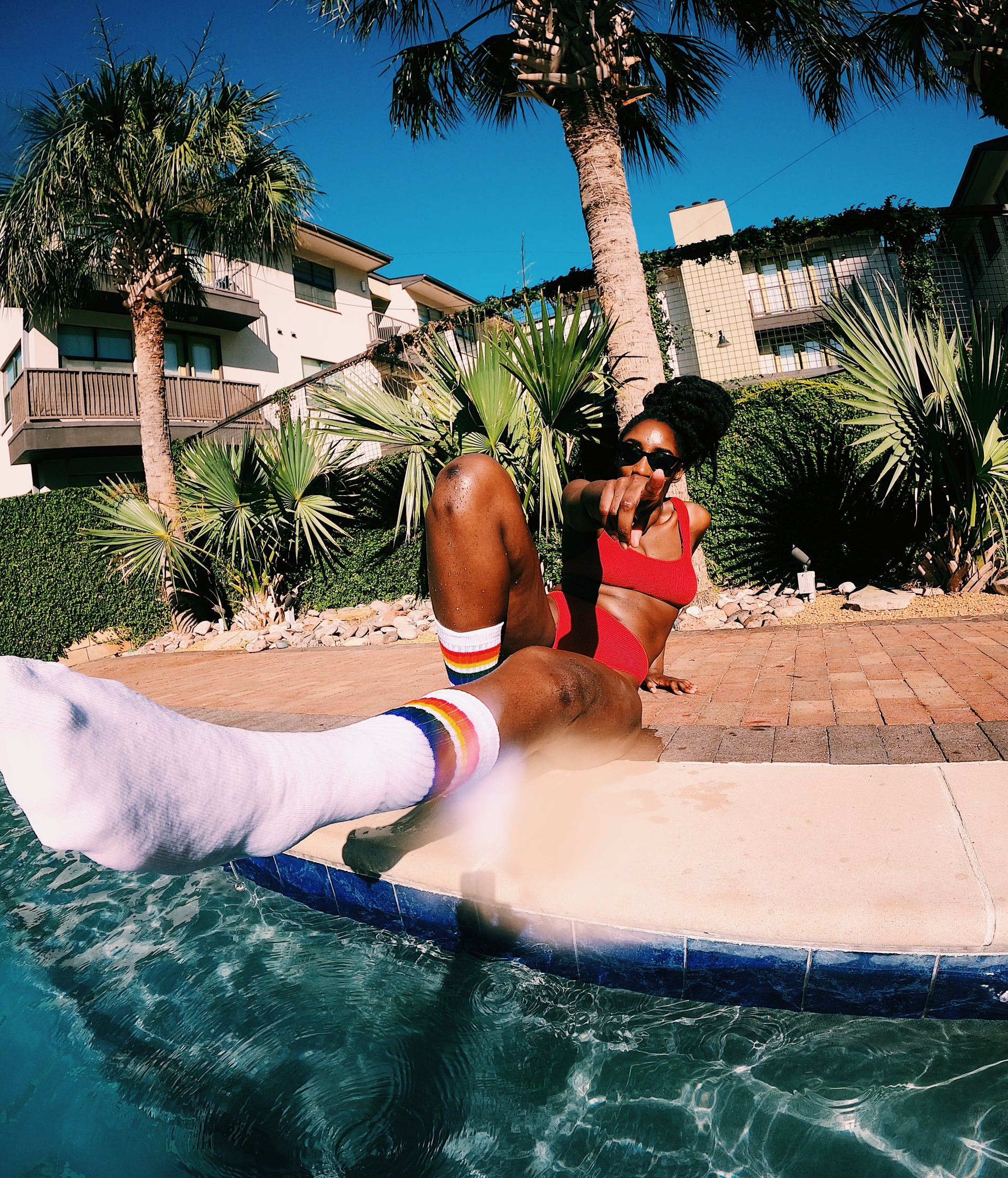 when you are swimming in the pool and love your pride socks