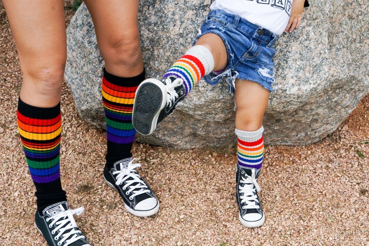 Power rainbow knee high socks styled with mom and daughter matching converse shoes