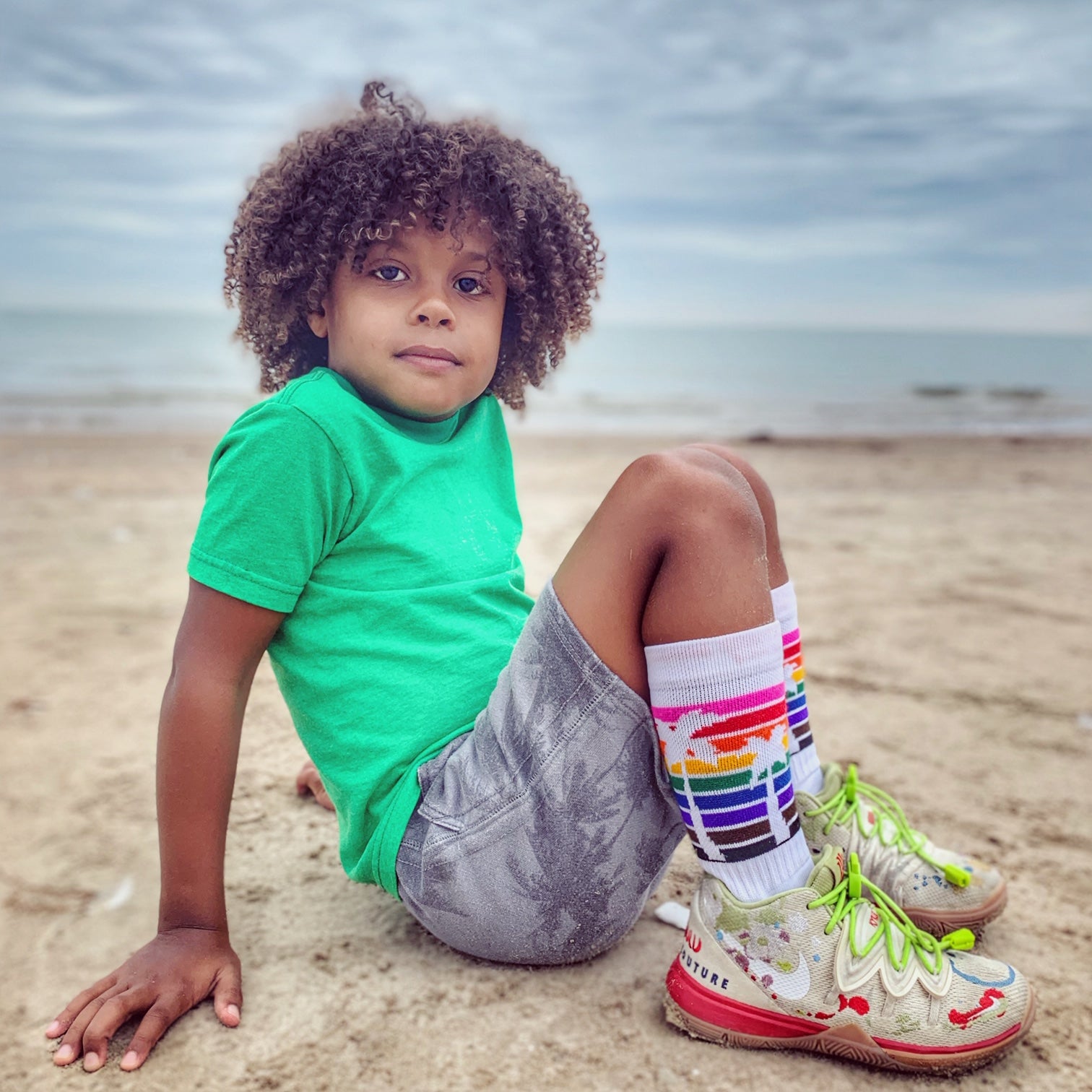 john wearing his palm tree rainbow socks from pride socks