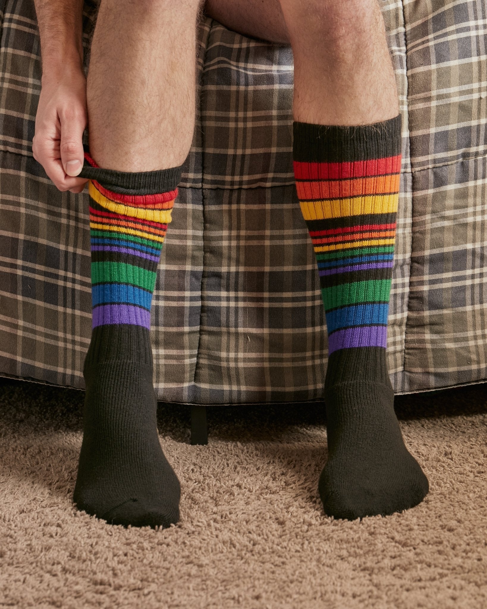 Close-up of Power rainbow knee high tube socks by Pride Socks