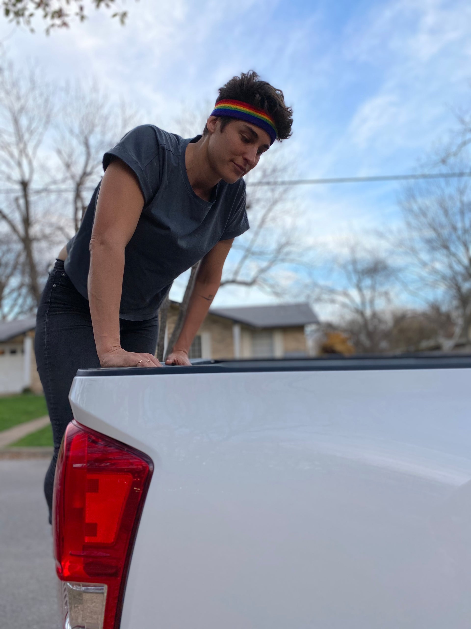 rainbow pride headband and wristbands worn during work